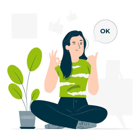 Jeune femme assise par terre, signe OK avec les doigts, en train de décrire un diagnostic thermique maison obligatoire, près d’une plante d’intérieur.